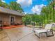 Relaxing deck with seating area and lush green scenery offers a perfect spot to unwind and enjoy the outdoors at 2956 Springlake Dr, Buford, GA 30519
