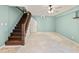 Finished basement space featuring tile floor, stair access, and neutral paint at 2956 Springlake Dr, Buford, GA 30519