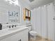 Bathroom featuring a white vanity, mirror, and a shower with a white curtain at 2956 Springlake Dr, Buford, GA 30519