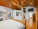 Spacious bedroom with a wood-paneled ceiling, and an ensuite bathroom at 2956 Springlake Dr, Buford, GA 30519