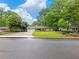 Charming single-story home with a well-manicured front lawn and long driveway at 2956 Springlake Dr, Buford, GA 30519