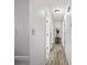 Hallway with clean, neutral paint, wood floors, and recessed lighting at 2956 Springlake Dr, Buford, GA 30519