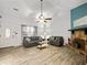 Bright living room with fireplace, comfortable seating, and a beautiful front door at 2956 Springlake Dr, Buford, GA 30519