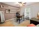Dedicated office space with built-in shelving and modern furnishings for remote work at 2956 Springlake Dr, Buford, GA 30519