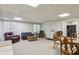 Finished basement featuring multiple sitting areas and neutral carpet at 4070 Ridgehurst Se Dr, Smyrna, GA 30080
