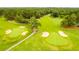 Lush green golf course with manicured fairways and scenic sand traps at 5200 Woodmont Dr, Villa Rica, GA 30180