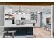 Bright kitchen with stainless steel appliances, white cabinets, large island, and breakfast nook at 5200 Woodmont Dr, Villa Rica, GA 30180