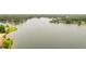Scenic lake view surrounded by residential homes and lush green landscapes at 5200 Woodmont Dr, Villa Rica, GA 30180