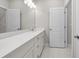 Elegant bathroom with expansive vanity, soft lighting, and tiled flooring creates a serene atmosphere at 896 Farmstead Rd # 162, Suwanee, GA 30024