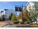 Harvest Park sign welcomes you to a neighborhood of townhomes and houses at 896 Farmstead Rd # 162, Suwanee, GA 30024