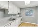 A bright kitchen features plenty of cabinet space and modern appliances at 91 Rumson Ne Rd # B25, Atlanta, GA 30305
