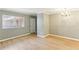 Bright and open living room featuring neutral paint, wood floors and a chandelier at 91 Rumson Ne Rd # B25, Atlanta, GA 30305
