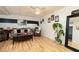 Basement living area featuring a couch, coffee table, stylish decor, and light wood floors at 128 Champion Way, Hiram, GA 30141