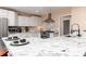 A kitchen with granite countertops, stainless steel appliances, and white cabinets at 128 Champion Way, Hiram, GA 30141