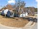 Charming home with a two-car garage, mature trees, and a well-manicured lawn at 2540 Park Ave, Austell, GA 30106