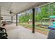 Expansive backyard featuring a covered patio, outdoor kitchen, and play area for outdoor activities at 31 Copper Leaf Ct, Villa Rica, GA 30180