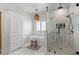 Modern bathroom with freestanding tub, glass-enclosed shower, and stylish fixtures with bright lighting at 31 Copper Leaf Ct, Villa Rica, GA 30180