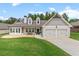 Beautiful home with well-maintained lawn, attractive landscaping, and an attached two-car garage at 31 Copper Leaf Ct, Villa Rica, GA 30180