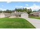 Inviting home showcasing well-kept grounds, a classic design, and an attached two-car garage at 31 Copper Leaf Ct, Villa Rica, GA 30180