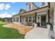 Charming front porch with rocking chairs and decorative details, creating an inviting entrance at 31 Copper Leaf Ct, Villa Rica, GA 30180