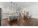 Bright, open-concept kitchen with a large island, modern appliances, and hardwood floors is perfect for cooking at 31 Copper Leaf Ct, Villa Rica, GA 30180