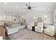 Open-concept living room with hardwood floors and vaulted ceilings connects to the kitchen, perfect for entertaining at 31 Copper Leaf Ct, Villa Rica, GA 30180