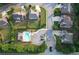 This aerial image showcases the layout of the community and its proximity to the community pool at 139 Vinca Cir, Suwanee, GA 30024
