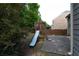 The home's backyard featuring a wooden playset and privacy fence at 139 Vinca Cir, Suwanee, GA 30024