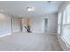 Spacious bonus room with neutral carpet and multiple entryways at 139 Vinca Cir, Suwanee, GA 30024