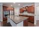 Gourmet kitchen with stainless steel appliances, granite countertops, and a subway tile backsplash at 139 Vinca Cir, Suwanee, GA 30024