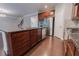 Gourmet kitchen with granite counters, stainless steel appliances, and dark wood cabinets at 139 Vinca Cir, Suwanee, GA 30024