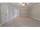 Spacious carpeted main bedroom with closet at 139 Vinca Cir, Suwanee, GA 30024