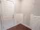 Mud room with decorative brick and exterior door at 139 Vinca Cir, Suwanee, GA 30024