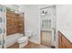 Bathroom featuring a tiled shower/tub combo with a view into the primary bedroom at 2945 Ashbyrn Ct, Buford, GA 30519