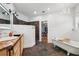 Luxurious primary bathroom with a soaking tub, dual vanities, and a separate closet at 2945 Ashbyrn Ct, Buford, GA 30519