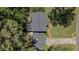 Overhead view of home with well-maintained roof, lush landscaping, and driveway, showcasing its prime location at 3287 Alton Rd, Atlanta, GA 30341
