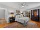 Cozy bedroom featuring hardwood floors, a plush rug, and comfortable furnishings, creating a tranquil and inviting retreat at 3287 Alton Rd, Atlanta, GA 30341