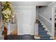 Inviting foyer with slate floors, staircase, and decorative accents, setting a welcoming tone at 3287 Alton Rd, Atlanta, GA 30341