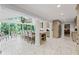 Bright open kitchen with large windows, a central island with bar seating, and modern appliances at 3287 Alton Rd, Atlanta, GA 30341