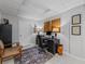 Office area with a desk and chair. Features light grey walls and natural light at 3287 Alton Rd, Atlanta, GA 30341