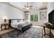 Comfortable bedroom with built-in shelves, a large window, and modern amenities at 3809 Wieuca Ne Rd, Atlanta, GA 30342
