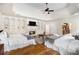 Spacious bedroom with fireplace, built-in shelving, and coffered ceiling, perfect for relaxation at 3809 Wieuca Ne Rd, Atlanta, GA 30342