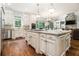 Well-appointed kitchen with stainless appliances, an island with seating, and plenty of countertop space at 3809 Wieuca Ne Rd, Atlanta, GA 30342