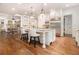 Gourmet kitchen featuring a center island with granite countertop, stainless steel appliances, and custom cabinetry at 3809 Wieuca Ne Rd, Atlanta, GA 30342