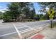 Home in a safe community near a crosswalk with a pedestrian sign for easy access at 3809 Wieuca Ne Rd, Atlanta, GA 30342