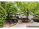 Backyard with a spacious deck and patio area, perfect for relaxing by the pool and enjoying outdoor living at 530 Twinflower Ct, Roswell, GA 30075