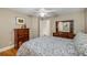 Bedroom with wood flooring and dresser at 530 Twinflower Ct, Roswell, GA 30075