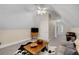 This bonus room offers carpet, ceiling fan, and a sofa at 530 Twinflower Ct, Roswell, GA 30075