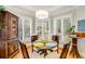 Charming breakfast nook with a round table, shuttered windows, and decorative touches at 530 Twinflower Ct, Roswell, GA 30075