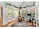 Bright exercise room with French doors, large windows, and a view of the backyard at 530 Twinflower Ct, Roswell, GA 30075